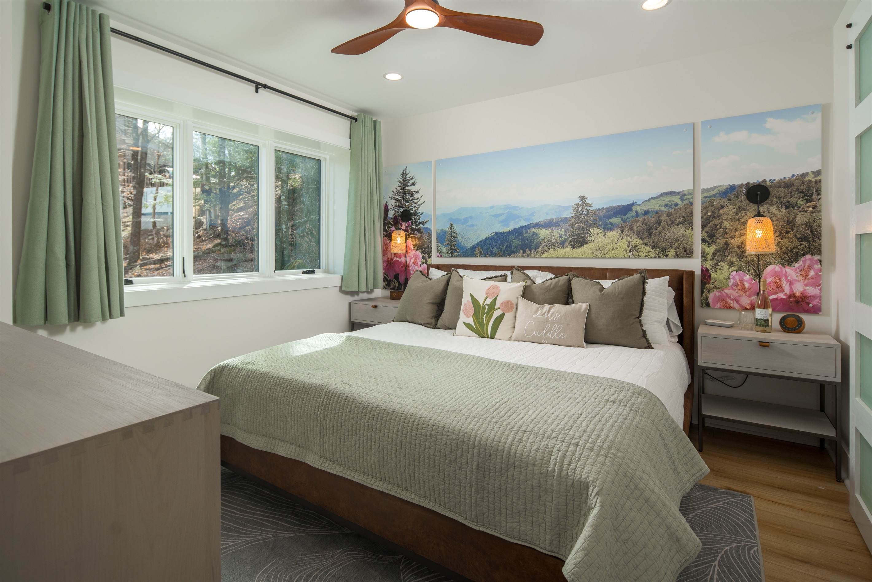 Spring Flowers Bedroom: Unwind with serene wooded views, a luxury king bed and 55' Roku TV.