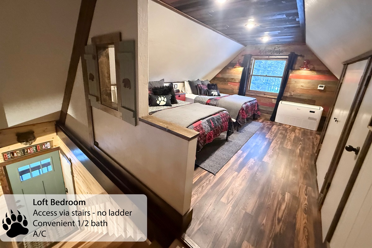 Spacious sleeping loft | 2 queen beds, 1 twin bed, air conditioning, electronics chargers, room-darkening curtains, closet, 1/2 bath. Accessible by stairs, not ladder.