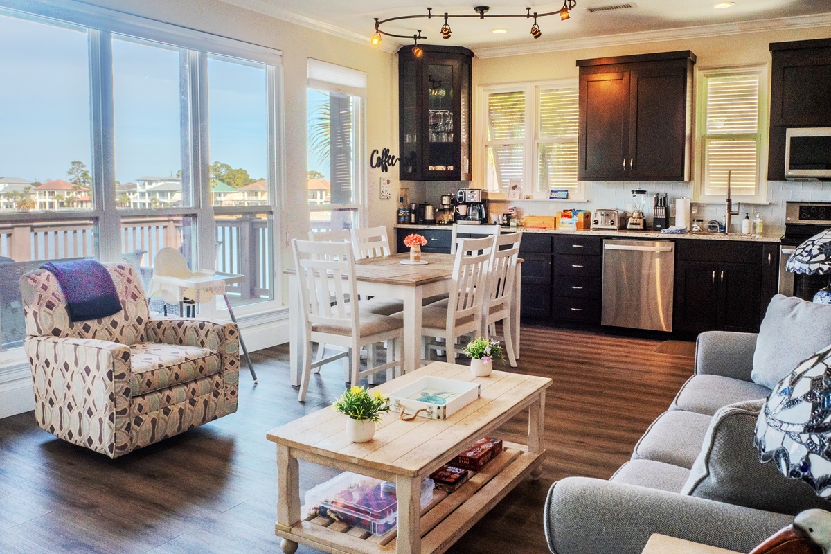 The open floorplan lets you easily move between kitchen, dining, and living area -- all with fantastic water views!