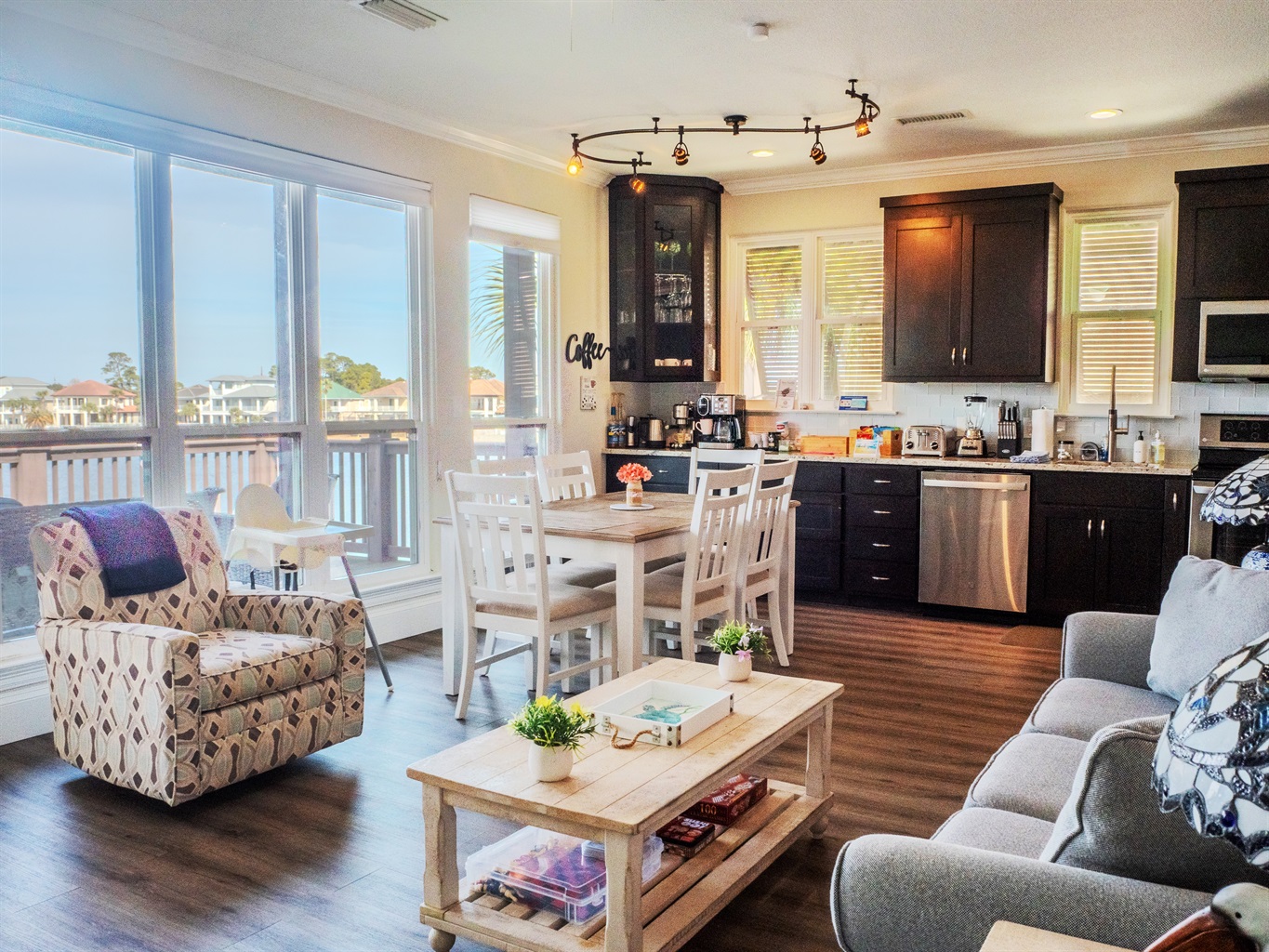 The open floorplan lets you easily move between kitchen, dining, and living area -- all with fantastic water views!