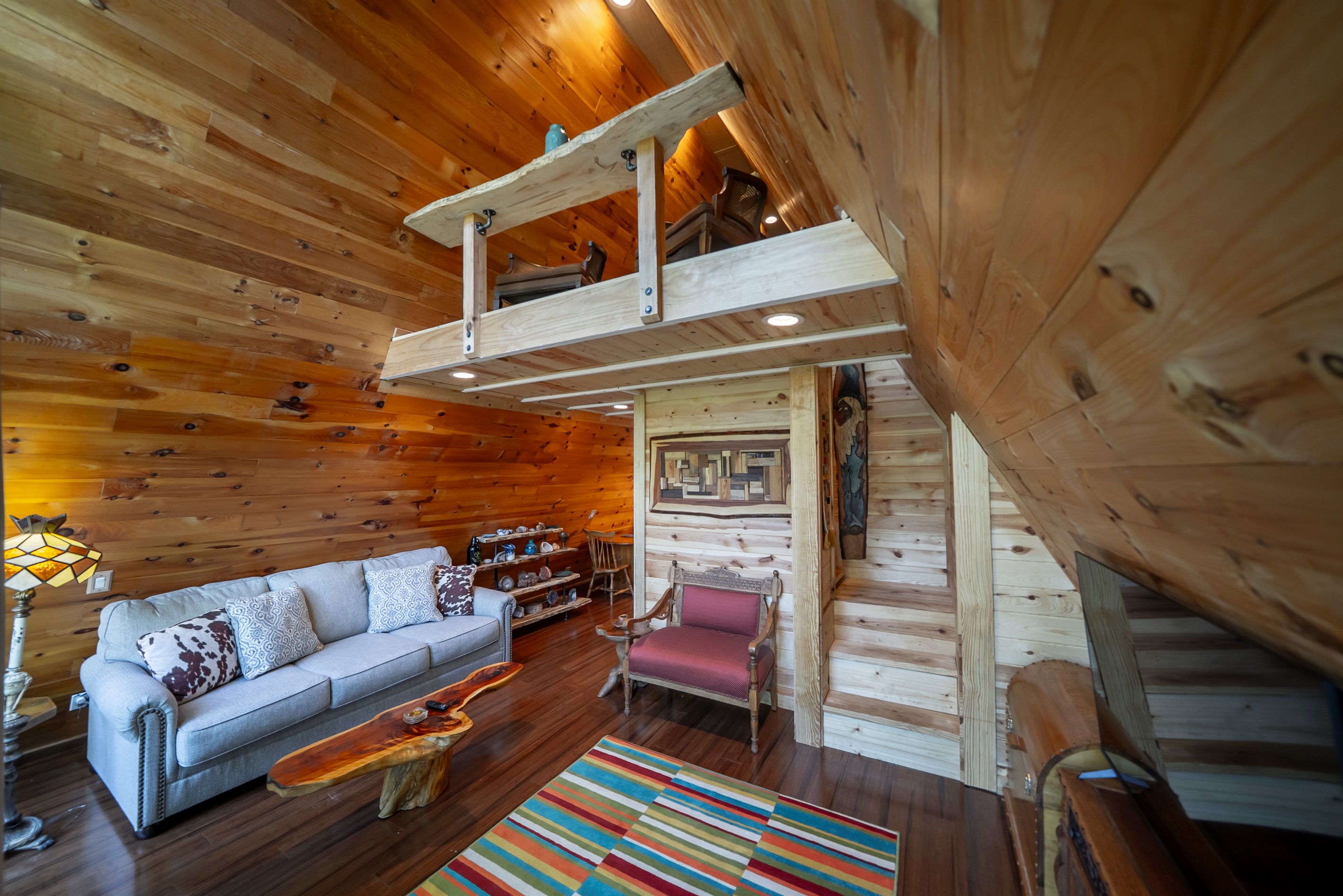 Settle in and unwind—this cozy living space is designed for slow mornings, movie nights, and everything in between.