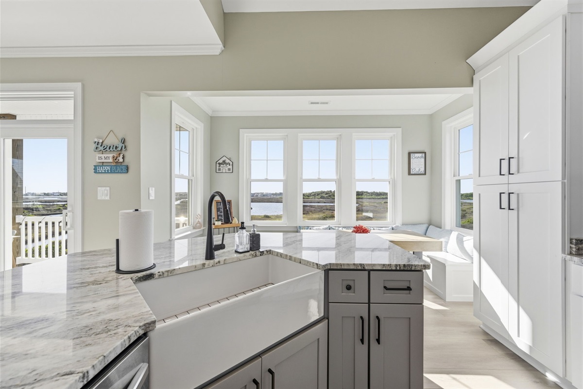 Morning coffee and sunset snacks belong at this window-side dining nook