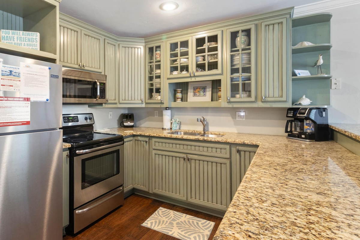 Find every appliance you'd want for a week of real cooking &mdash; and the breakfast bar makes it easy to keep the group together while you work.
