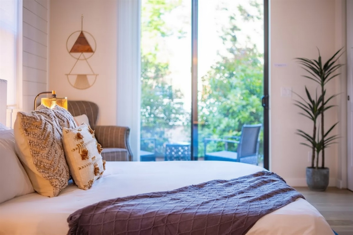 {Bedroom 1} King Suite with private patio access + luxurious ensuite bath.