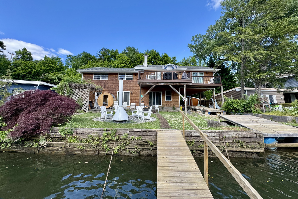 Private waterfront retreat with dock access and panoramic river views