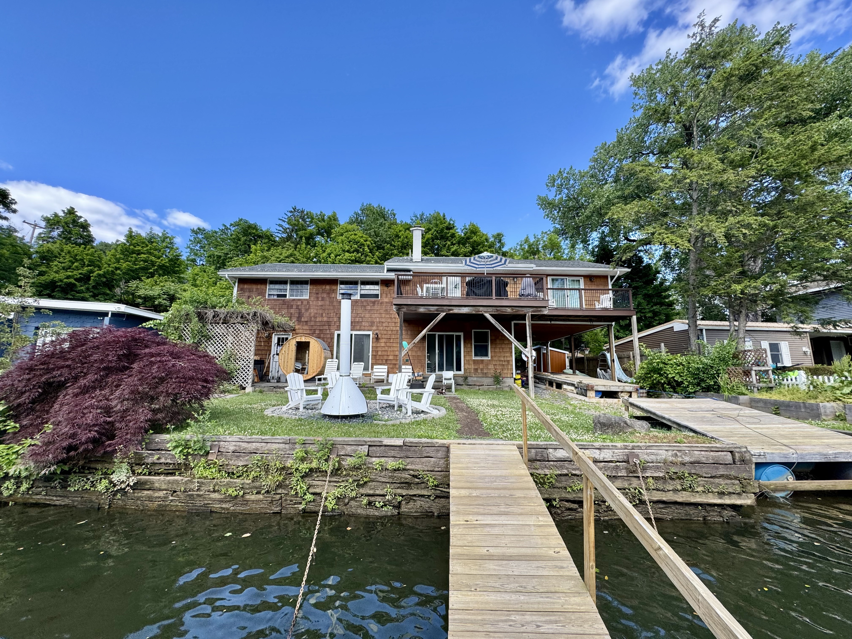 Private waterfront retreat with dock access and panoramic river views