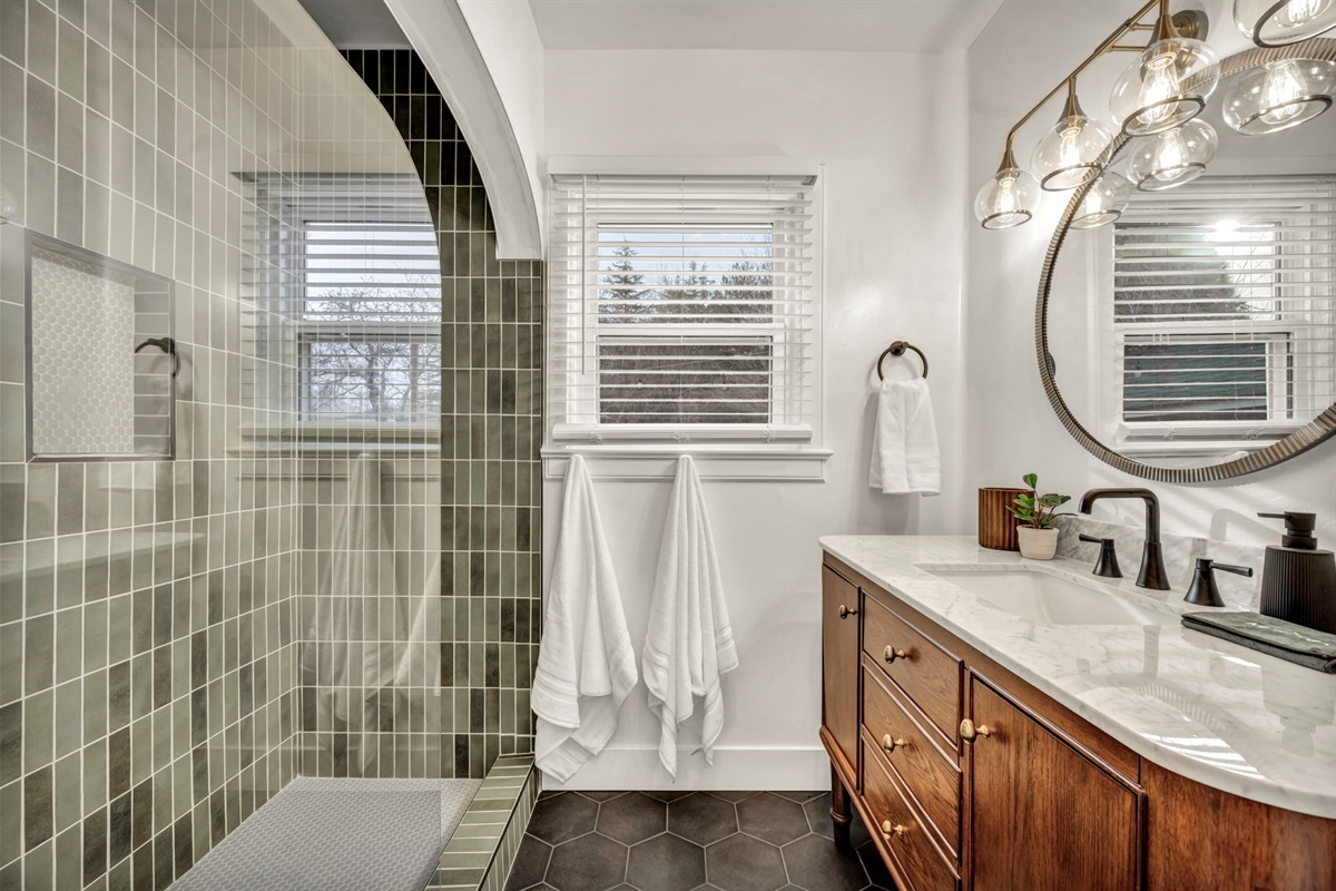 A tub and shower in this second absolutely stunning bathroom.