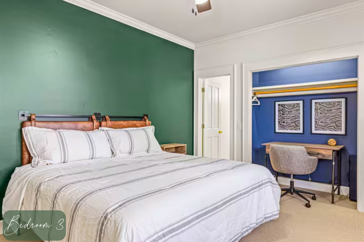 The Third Bedroom Has a Queen Bed and Dedicated Workspace