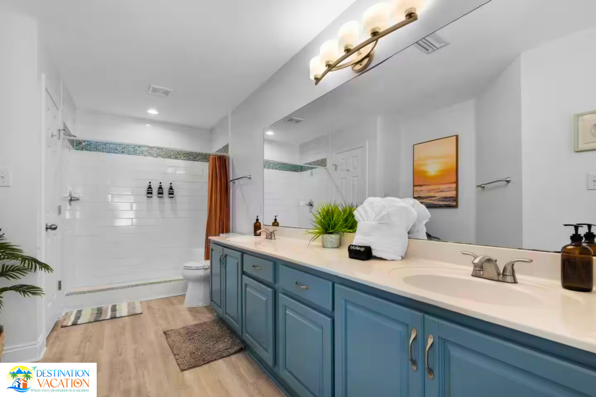 Crisp tilework adds timeless coastal sophistication.