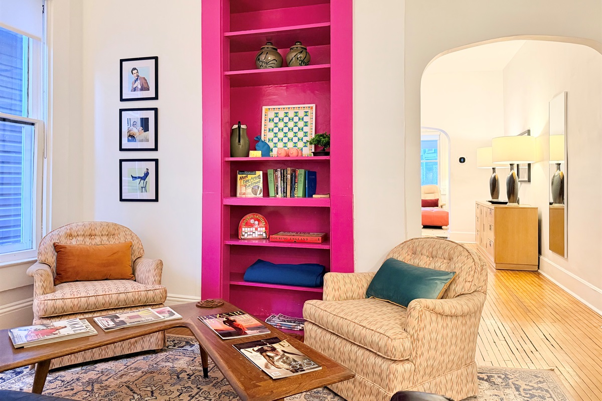 Mid-century modern meets vibrant pop culture in this cozy den space. 