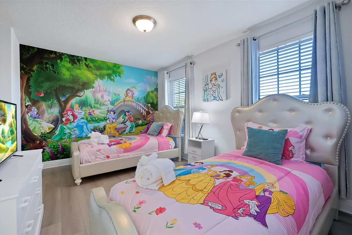 Two peaceful beds await your little princesses.