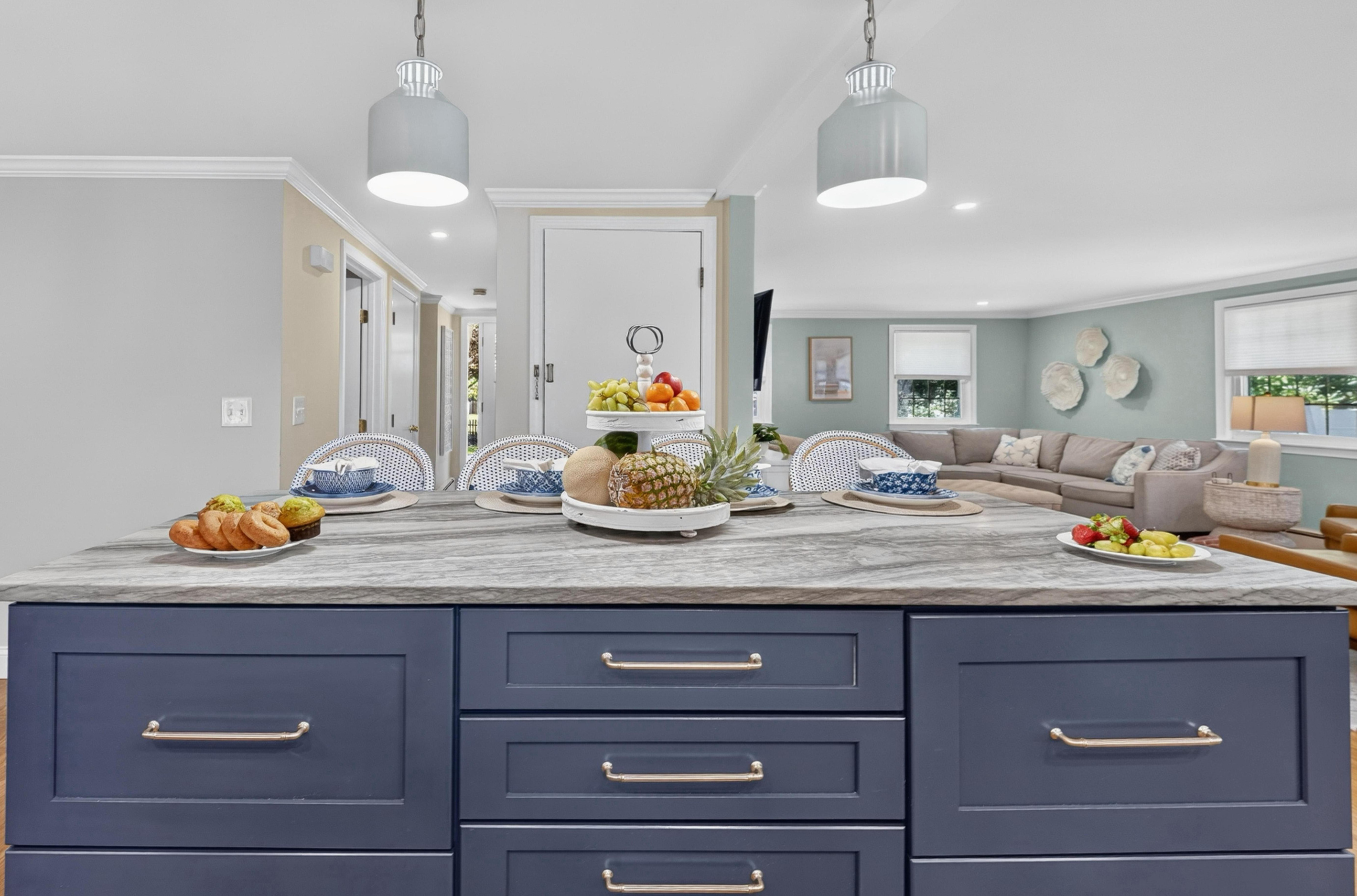 Oversized island offering plenty of room for cooking, serving, and gathering.