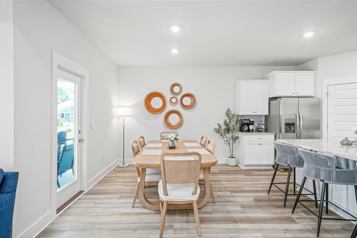 Bright open-concept dining space perfect for family meals seating for up to 9 guests