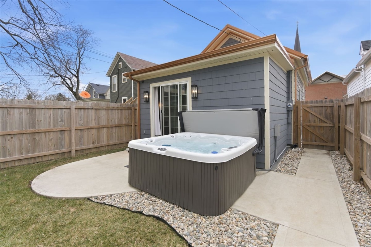 Relax in the hot tub just steps from the home, perfect for day or night unwinding