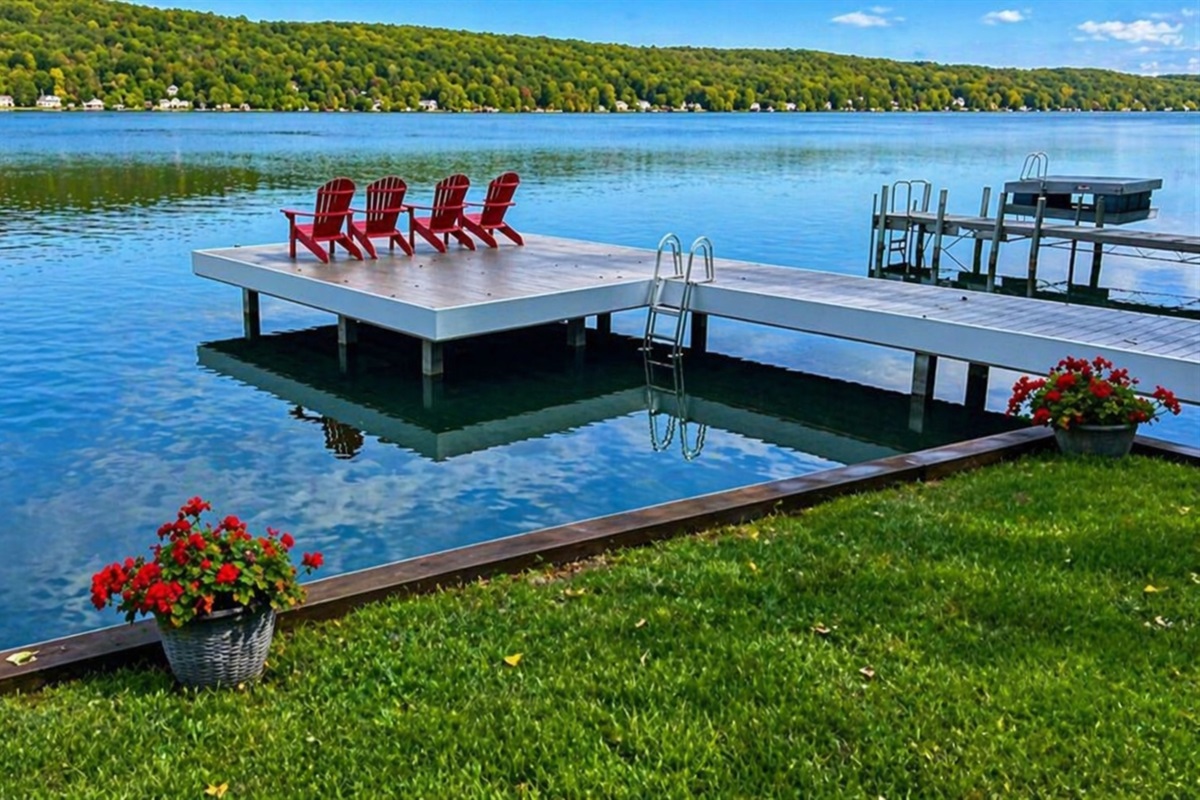 Calm waters, crisp air, and a floating dock that invites you to relax. Experience the beauty of all four seasons right here on the lake! 