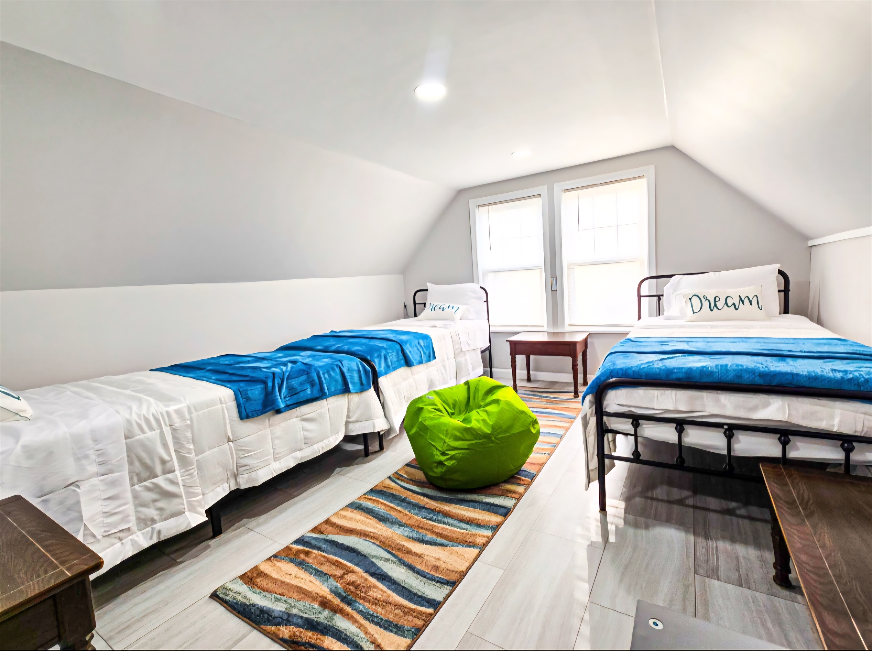 4th bedroom on the 3rd floor with 3 twin beds