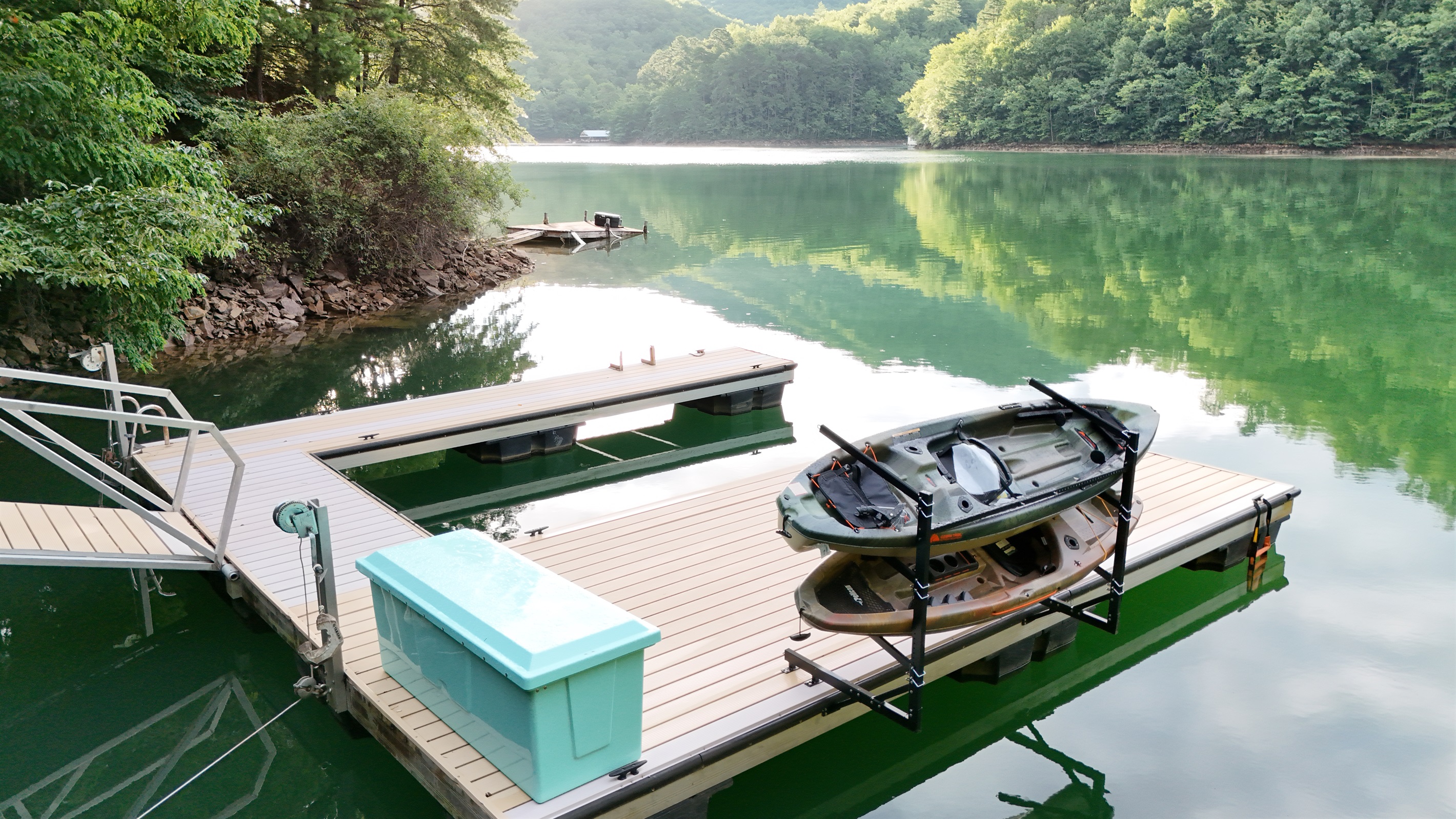 Kayak adventures await! Paddle across the crystal-clear lake from your private dock.