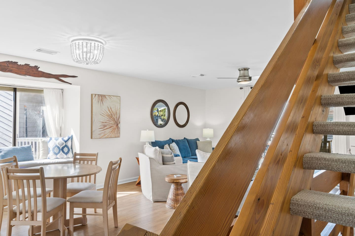 Head up these stairs and your private master suite is waiting at the top &mdash; it's the transition that makes this place feel like a real retreat.