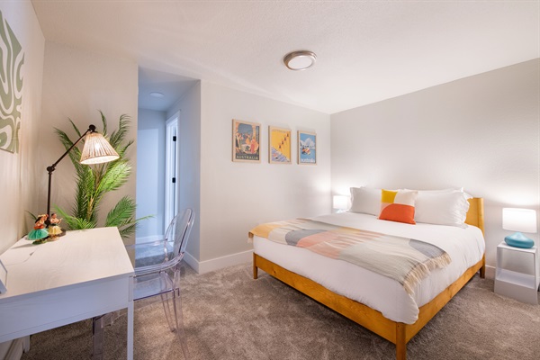 Another upstairs bedroom with an attached bathroom (though that bathroom opens up to the dining room area too), and desk and workspace in the privacy of your room.