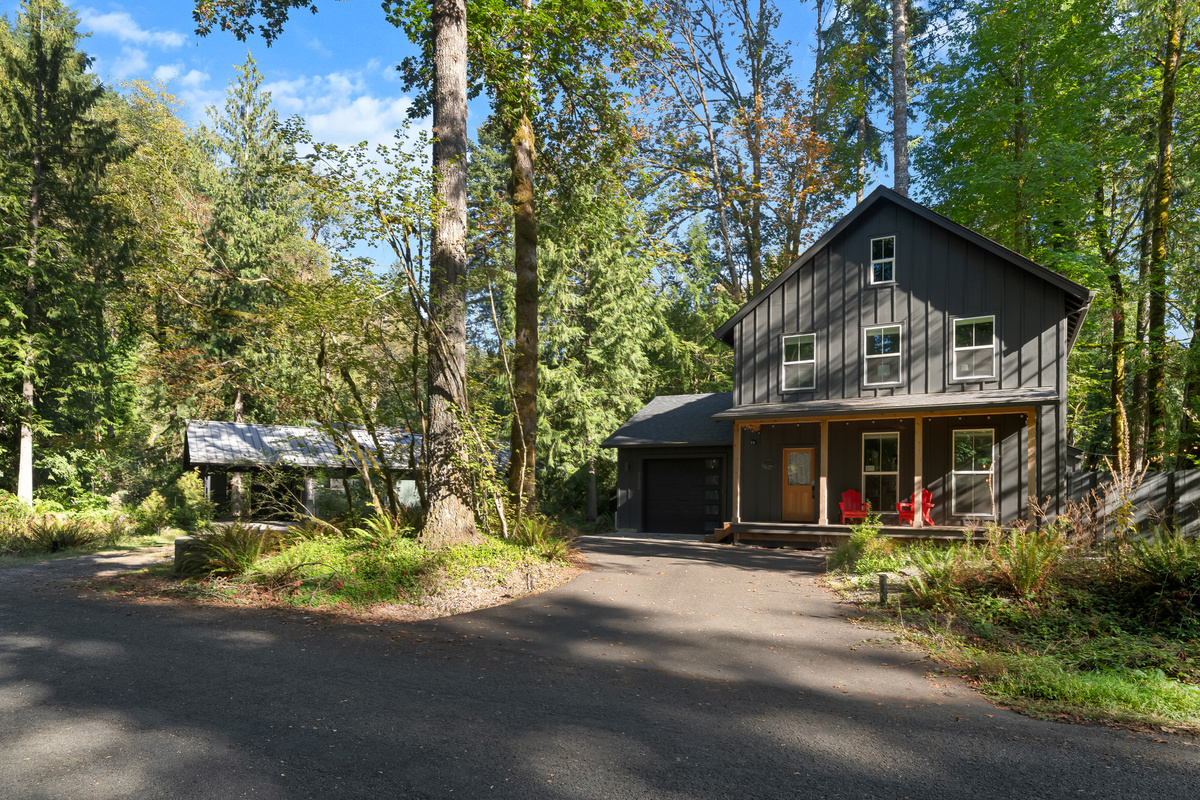 Your own private compound: two fully separate cabins, steps apart in the Mt. Hood woods.
