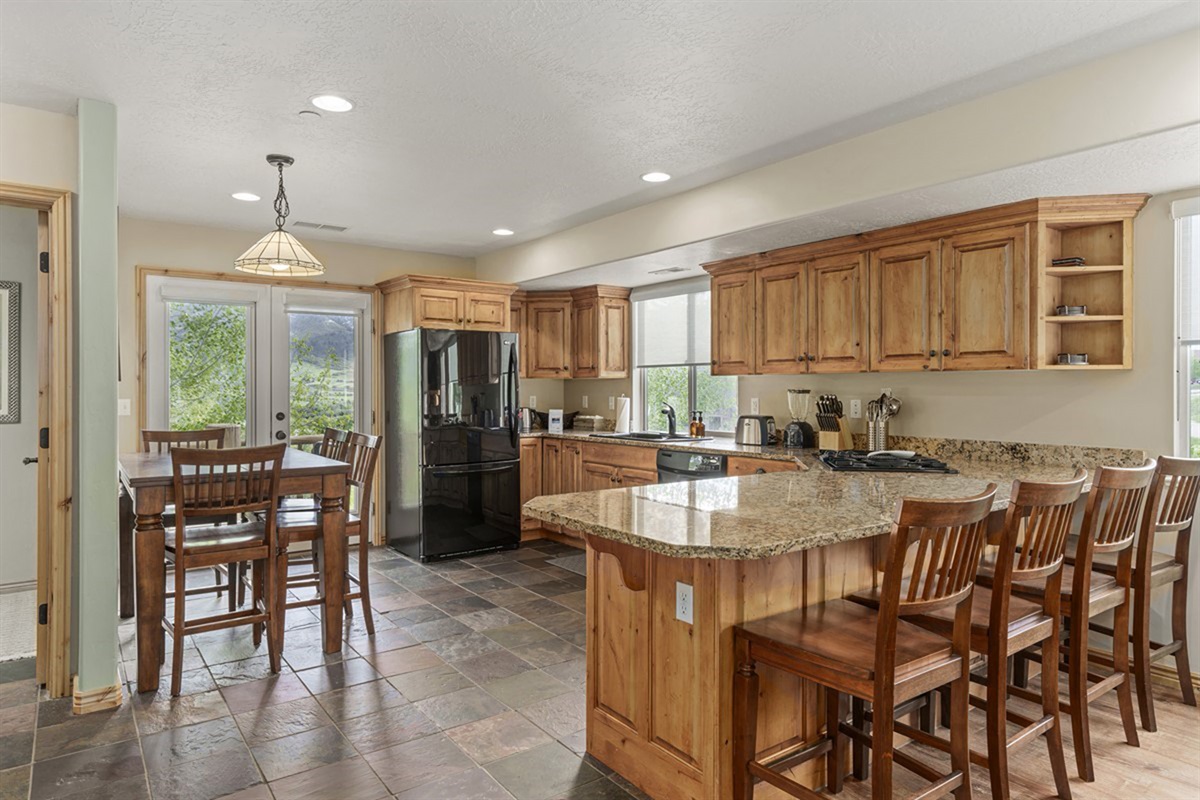 Gather around the island for coffee, conversation, or a casual meal before heading out.