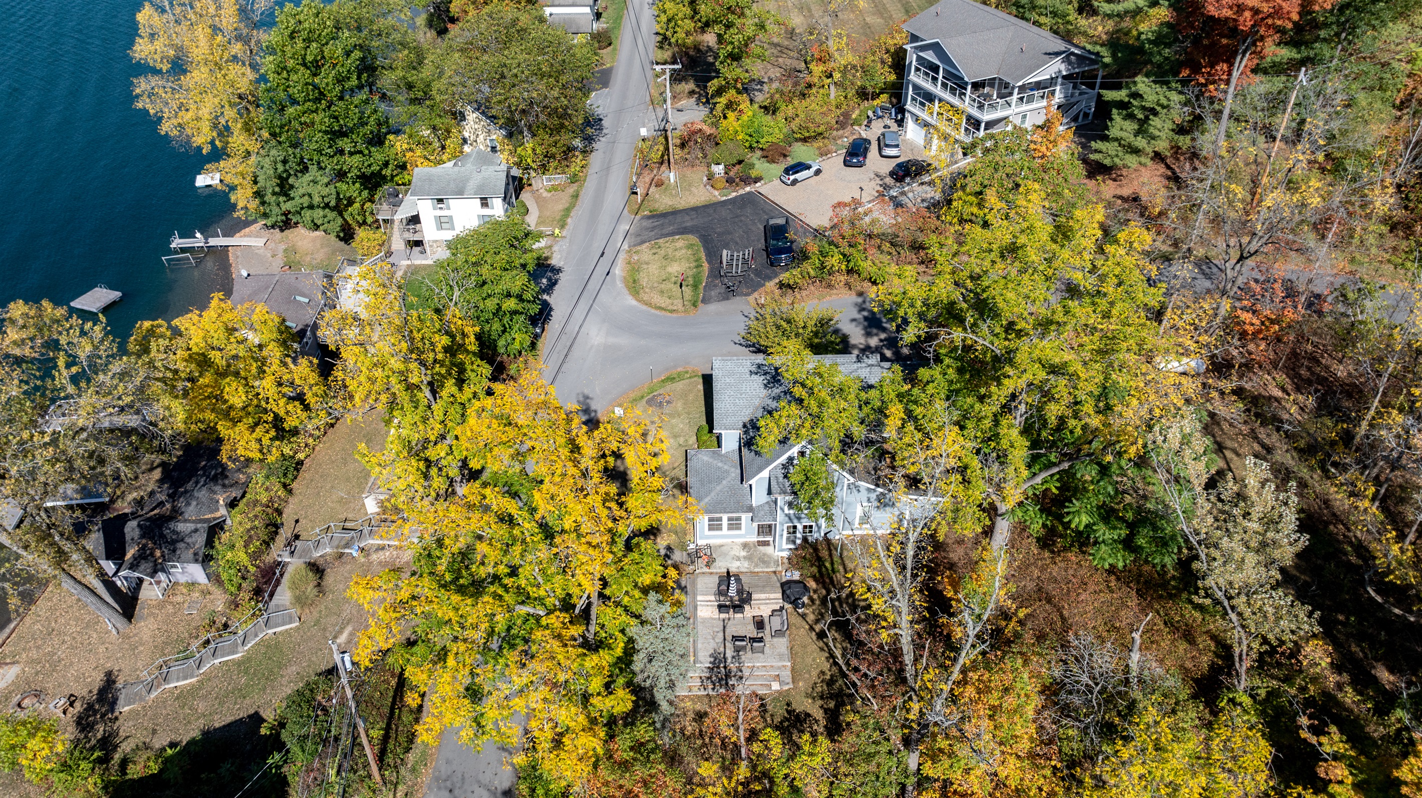 Beautifully framed by fall colors, this lakeside neighborhood captures the magic of autumn