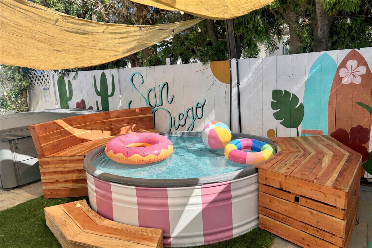 Introducing our newest backyard feature: a tank-style plunge pool, perfect for cooling off on sunny San Diego days! Please note: floaties pictured are for styling only and not included with the stay.