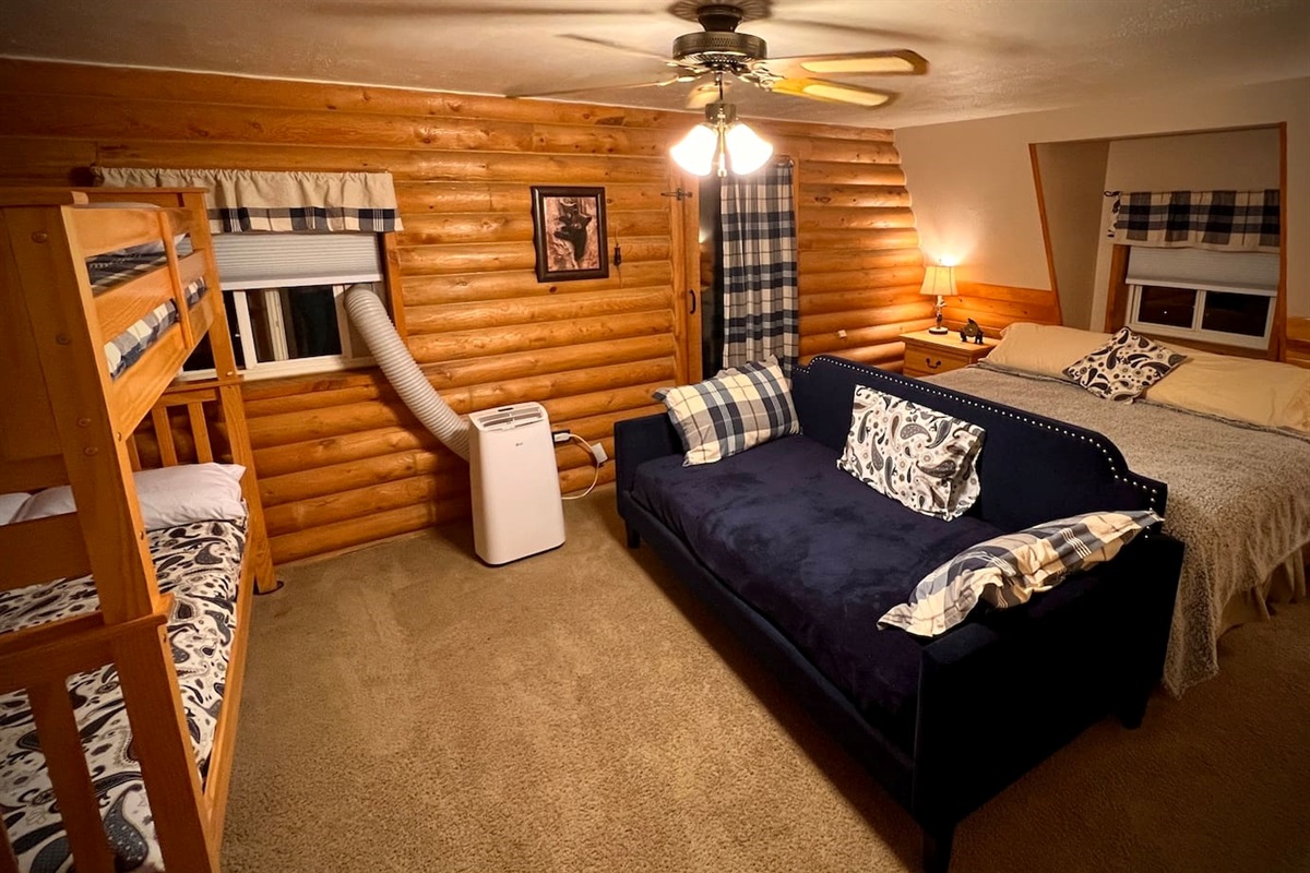 Cub Corner sleeps 8 and has its own bathroom, walk in closet, porta crib and balcony with views of Bear Lake.   It has a king bed, a full over full bunk bed with a trundle and a daybed and is located on the 2nd floor.