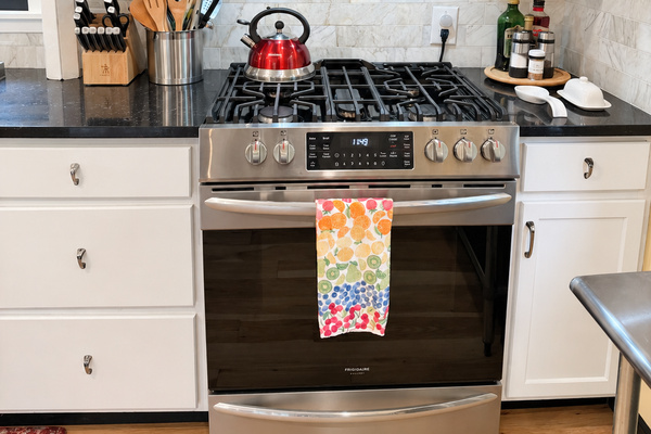 Whip up a wonderful dinner for your group in this immaculate kitchen with a gas stove.