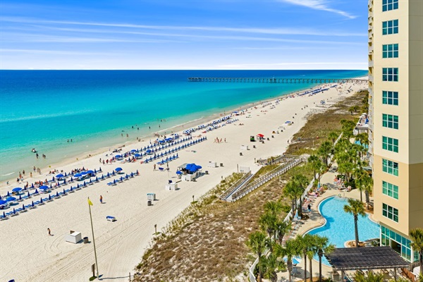 Aerial view of beach showcasing the new ADA compliance beach boardwalk (No Steps)!
