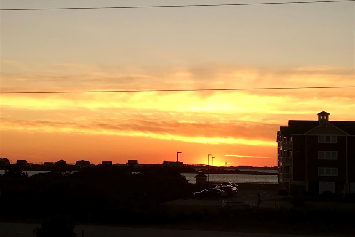 Enjoy the beautiful OBX Bay Sunsets from your balcony!