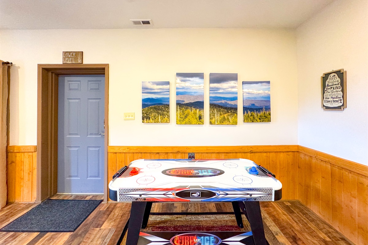 Air Hockey table in the game room