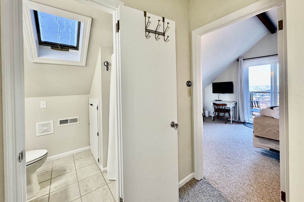 Our Top Floor Queen View Bedroom has a private balcony with sliding door to enjoy the mountain & valley views - the reason you stay in Seven Devils - high above it all! It also has a Desk, Chair, Roku Smart TV, & Twin Futon. Be nice & share that view!