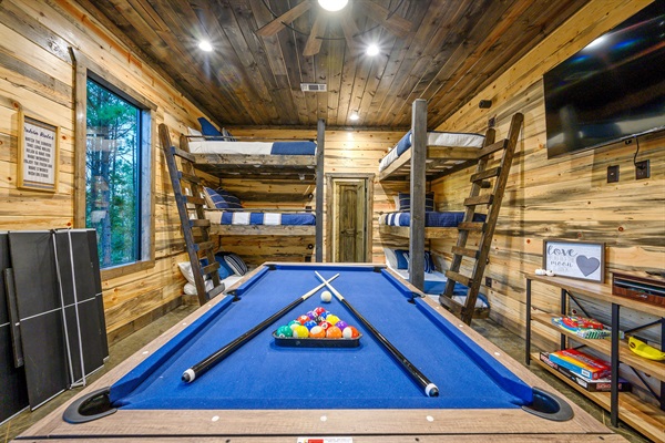 Stunning bunk room with action-filled games and 2 sets of bunk beds