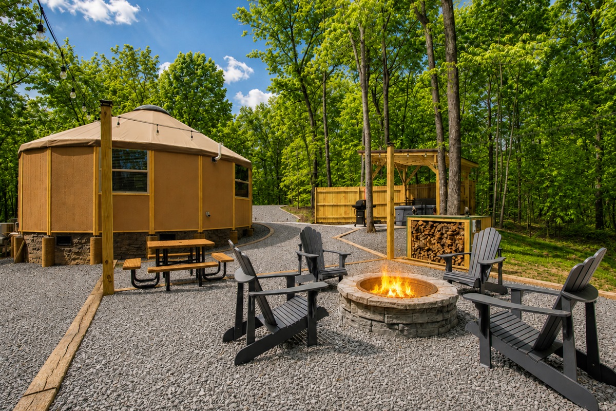 Firepit and outdoor seating area — perfect for evenings under the trees