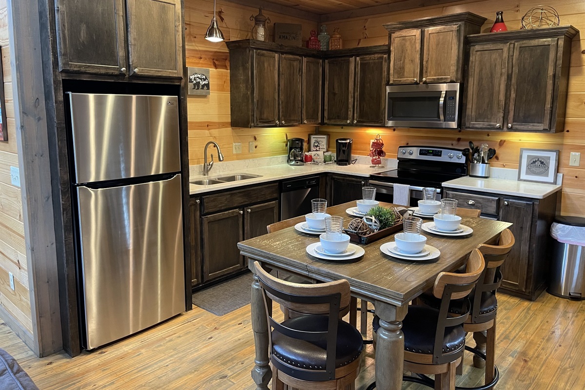 Well appointed kitchen with everything you need for your cabin time.  Starter supplies provided.