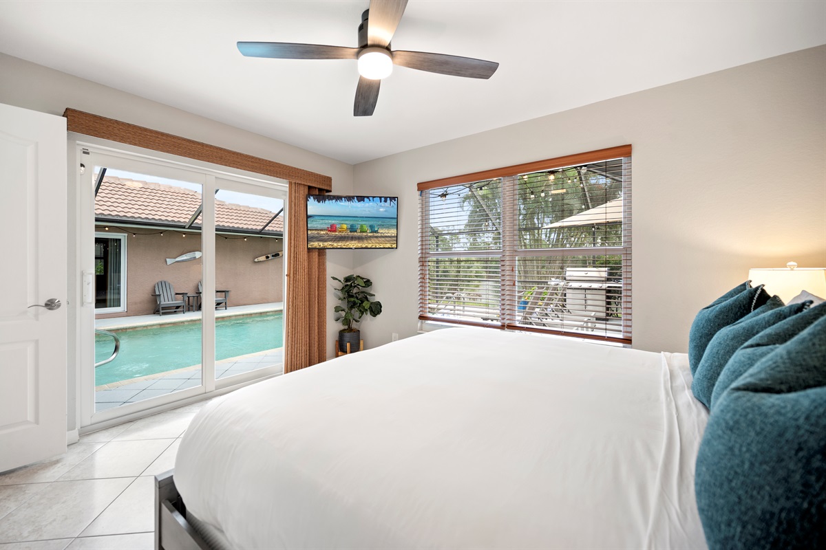 Wake up to pool views and sunshine in the second master bedroom