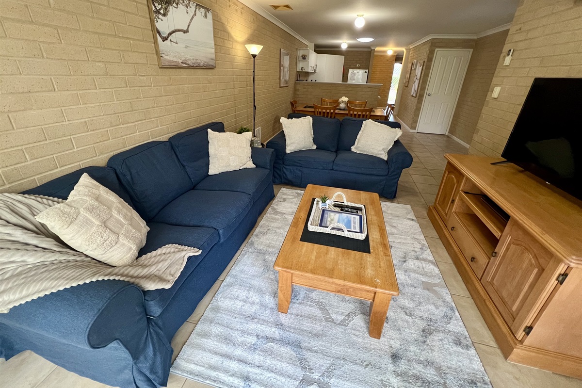 Open plan living/dining/kitchen for convenience