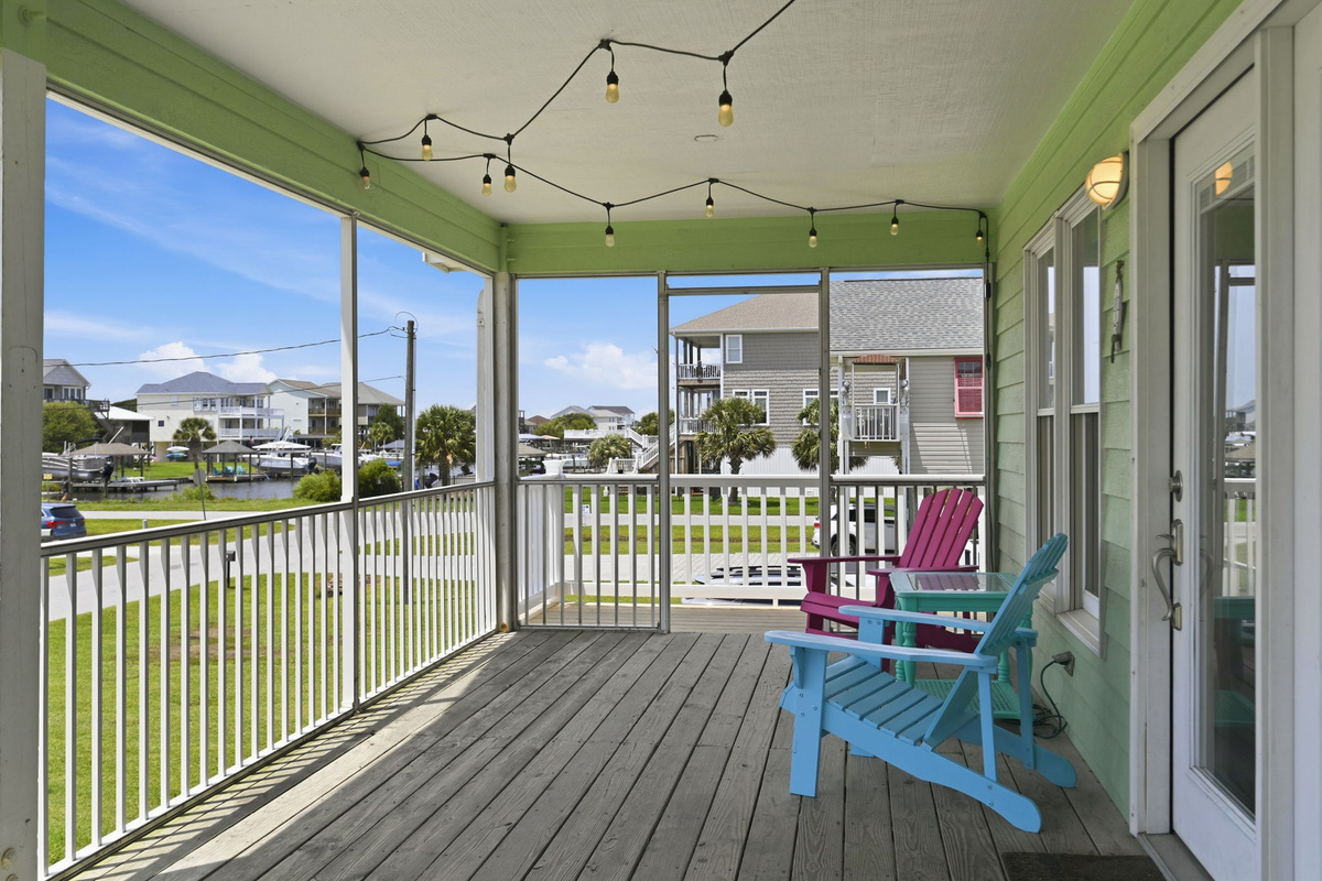 Unwind with your morning coffee or evening drink while overlooking the quiet beach neighborhood