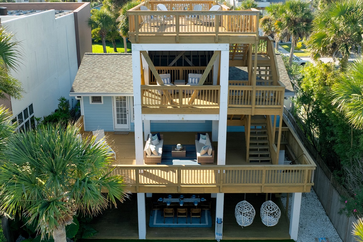 Multi-level coastal retreat with expansive decks + backyard entertaining space