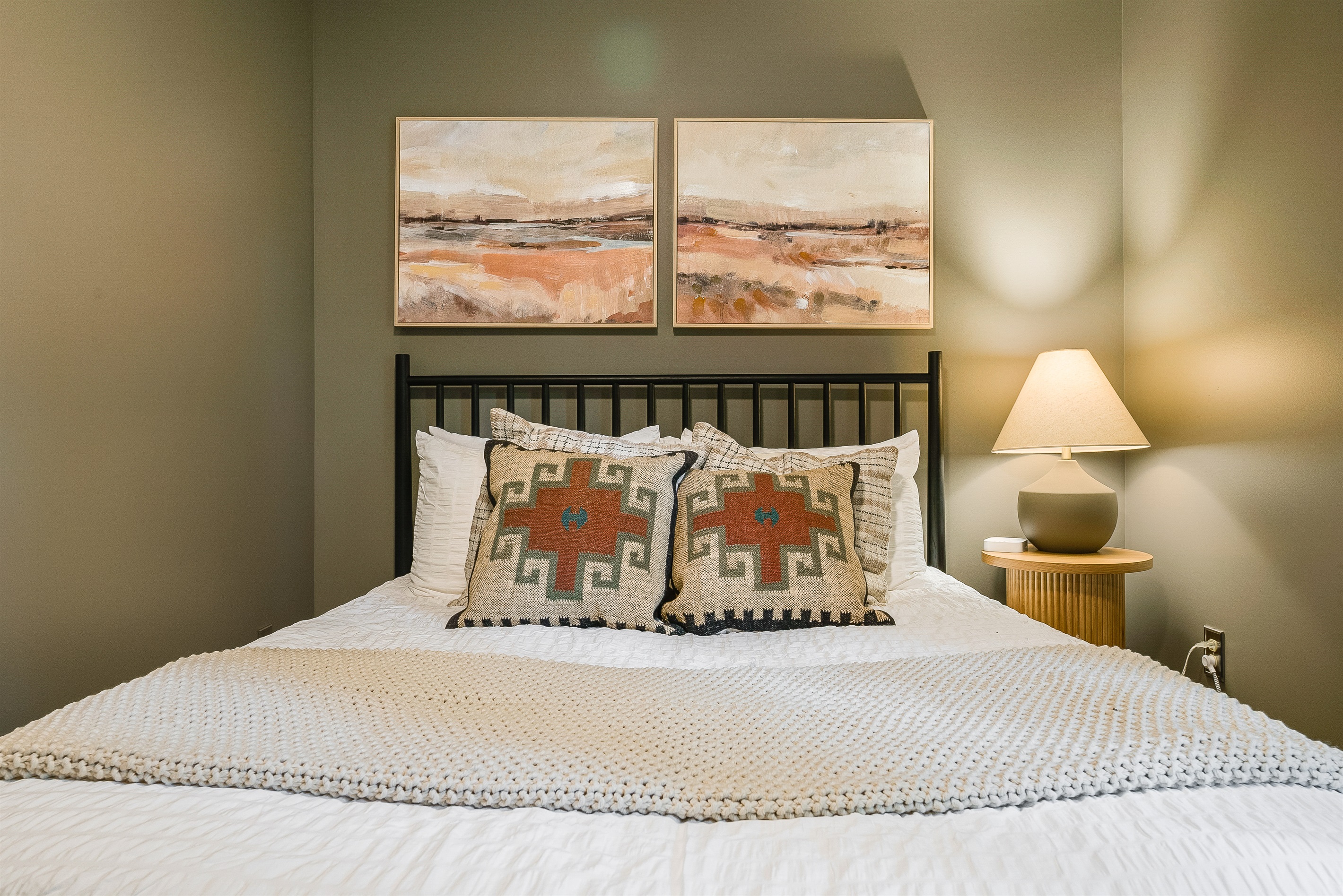 Queen bedroom offering both comfort and style