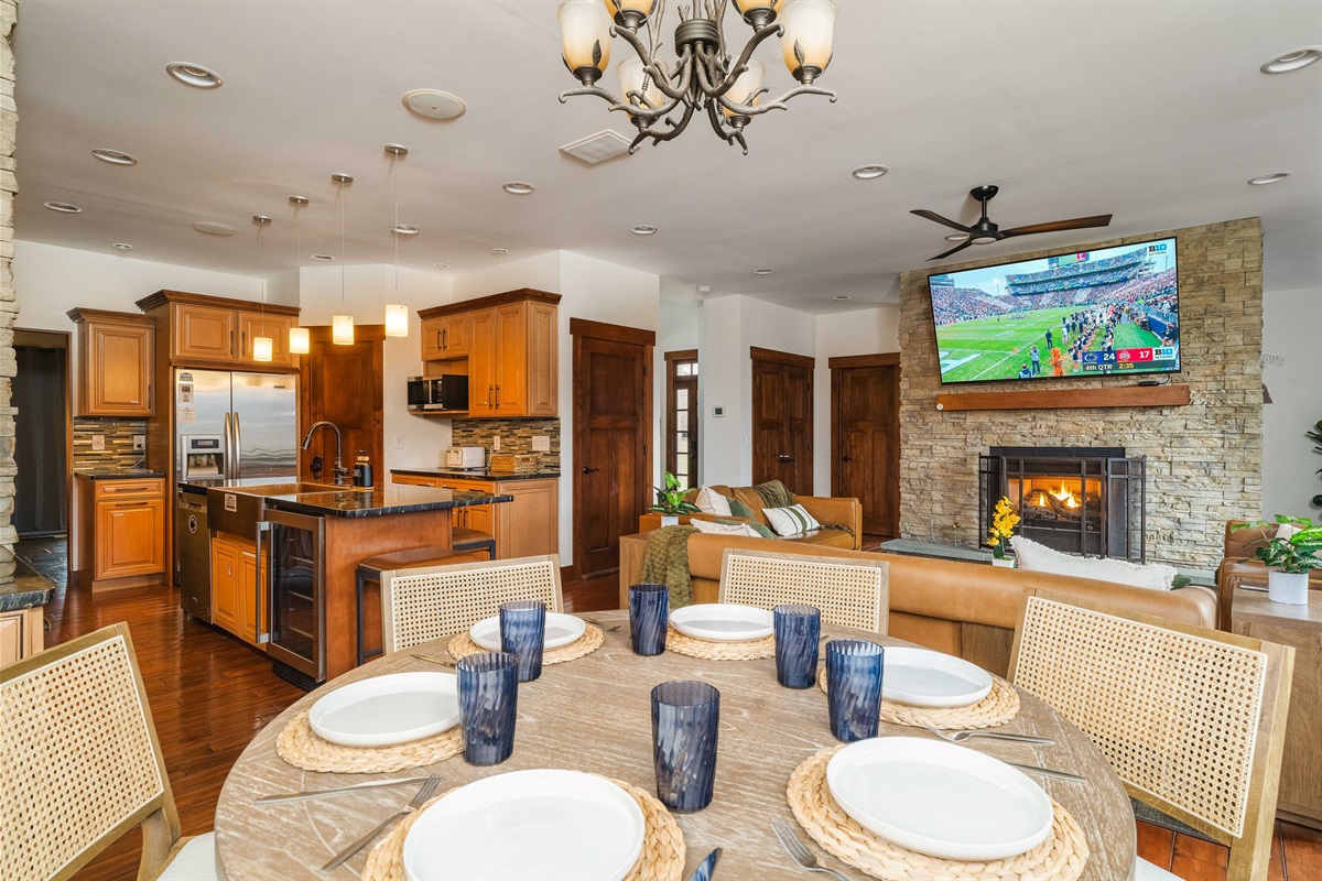 Chef-ready kitchen and large dining area keep everyone connected — perfect for shared meals, celebrations, and game-day spreads.
