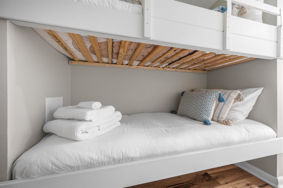Cozy bunk beds&mdash;perfect for kids or extra guests