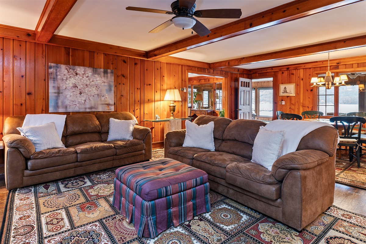 Relax and unwind in the open living room with wood fireplace(not usable by guests)main house