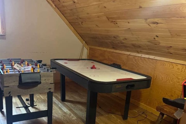 3-1 table with Fusbal, airhocky, and pool, and a full size air hockey table - as well as arcade games!