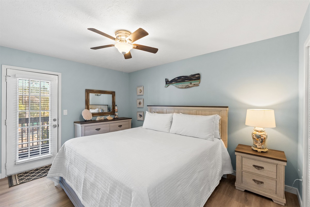 Master Bedroom with King Bed and Balcony Access