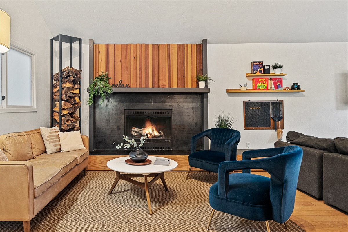 Never miss a beat with your group with this open floor plan with tree-top views. The living room & kitchen are all on the top floor & connected to the spacious & inviting upper deck.