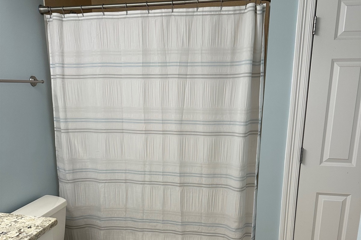 Guest bathroom with tub/shower combo