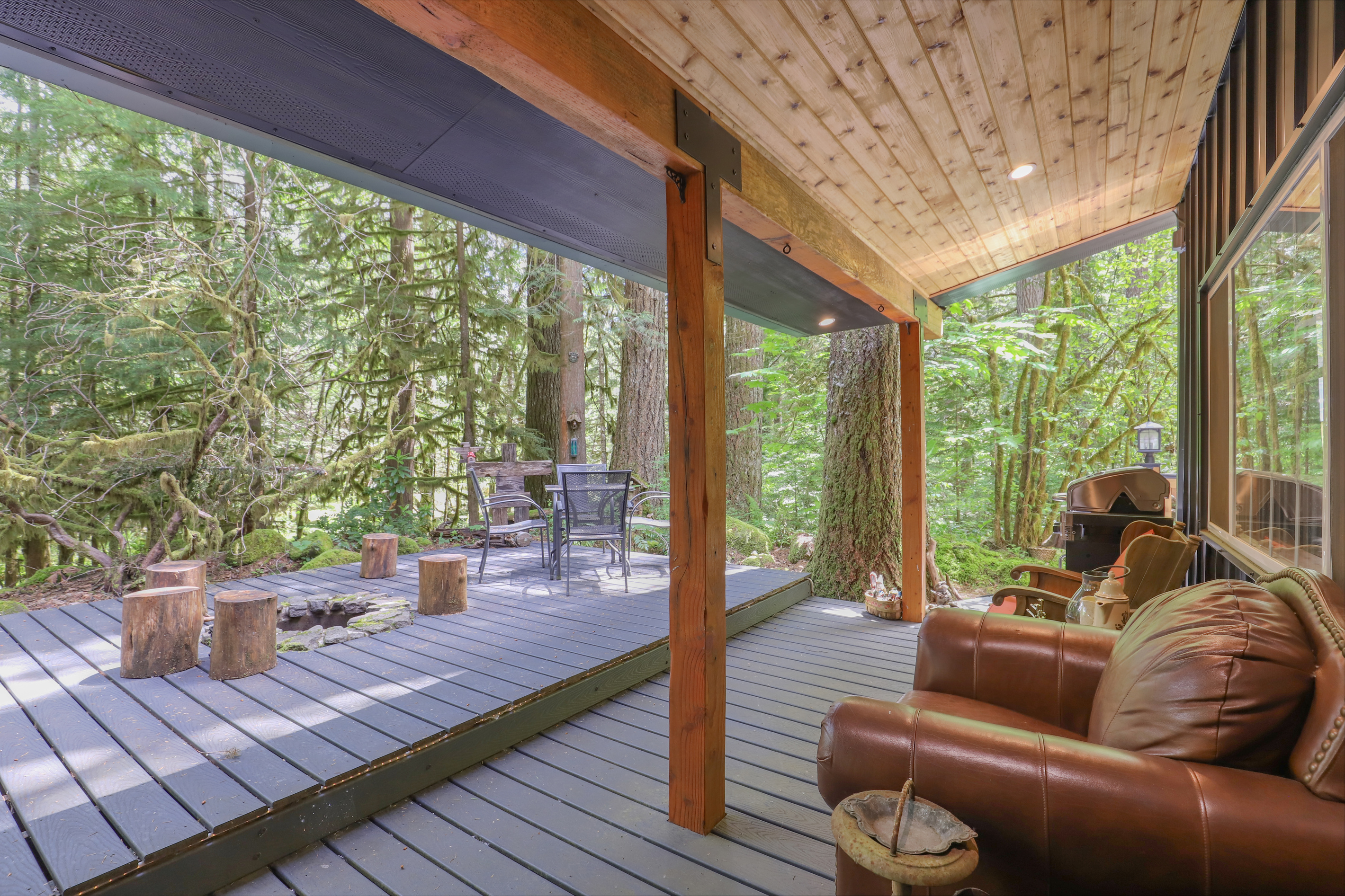 Oversized Leather Comfy Chair Looking Out Over Back Deck