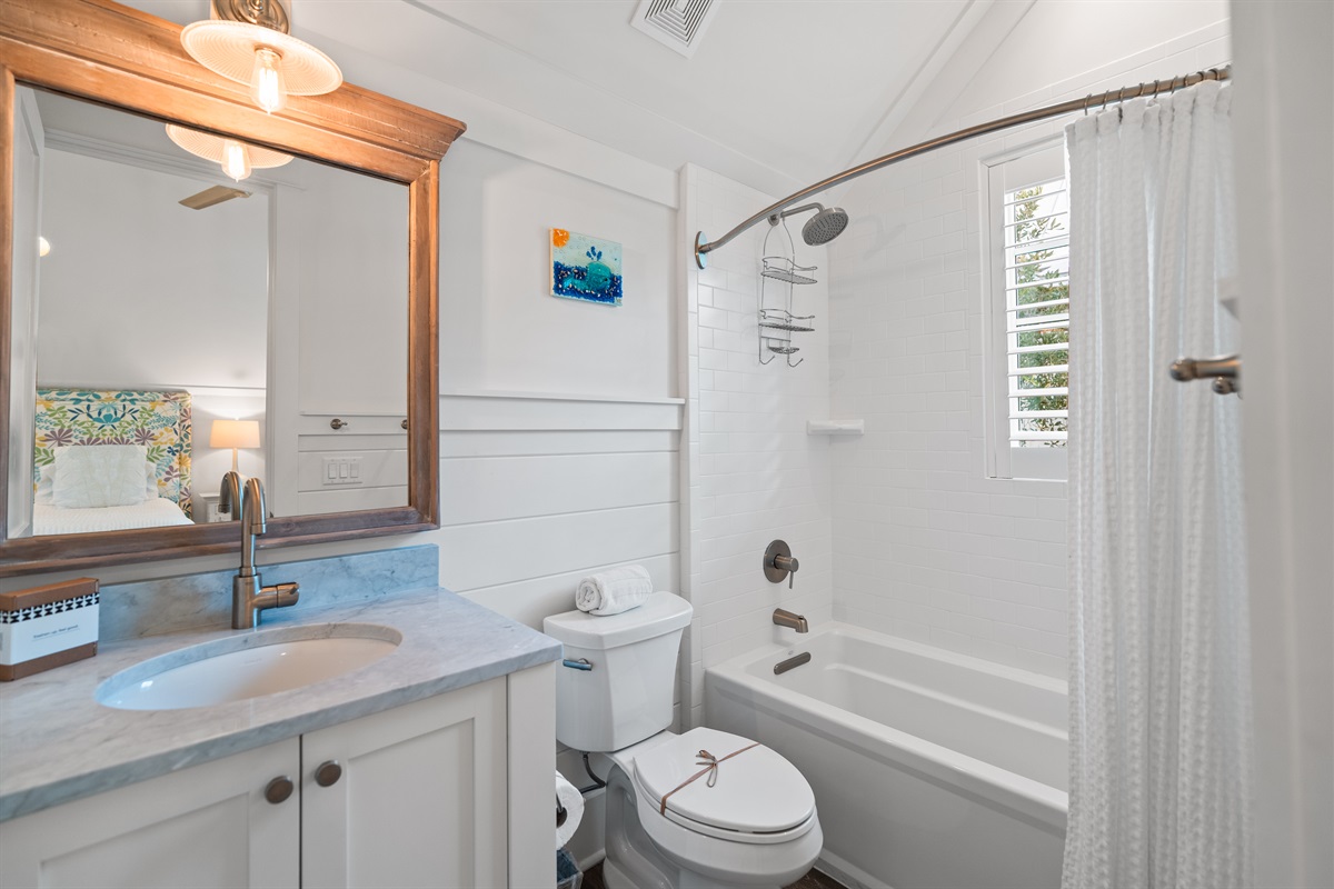 Ensuite bath for twin guest room. 